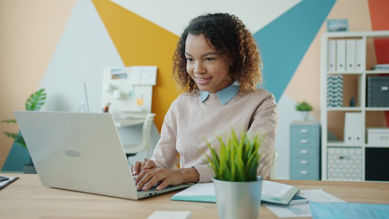 Student working on a laptop at a desk